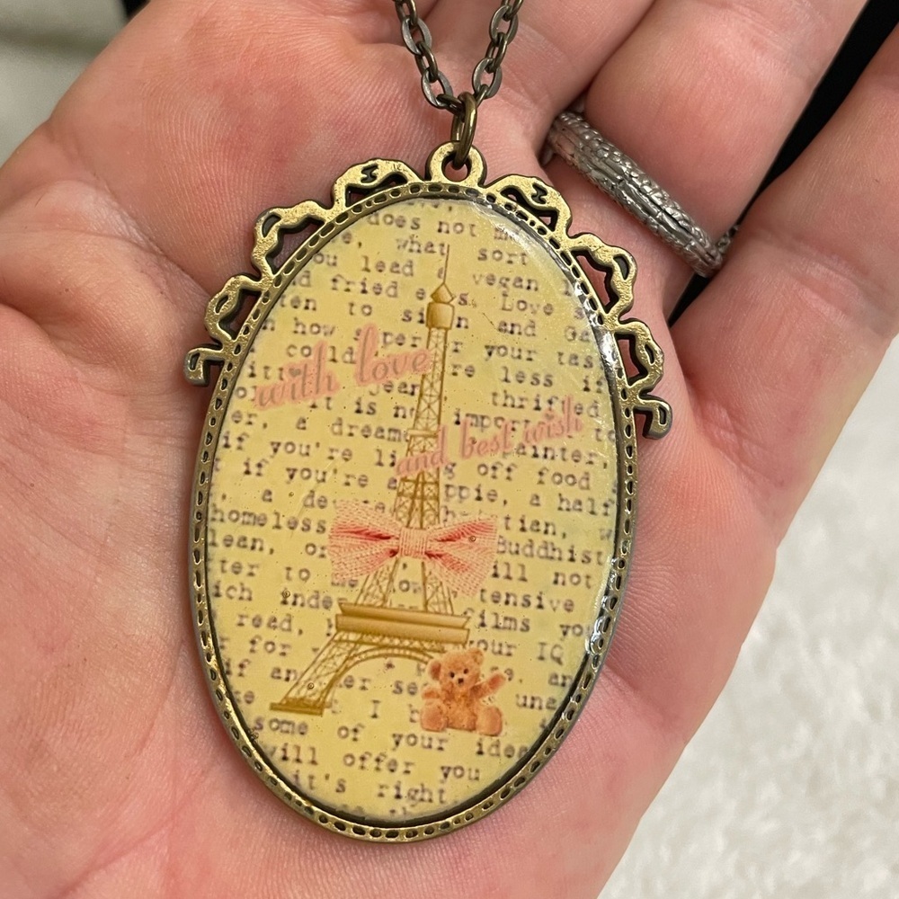 Aki Paris Themed pendant necklace